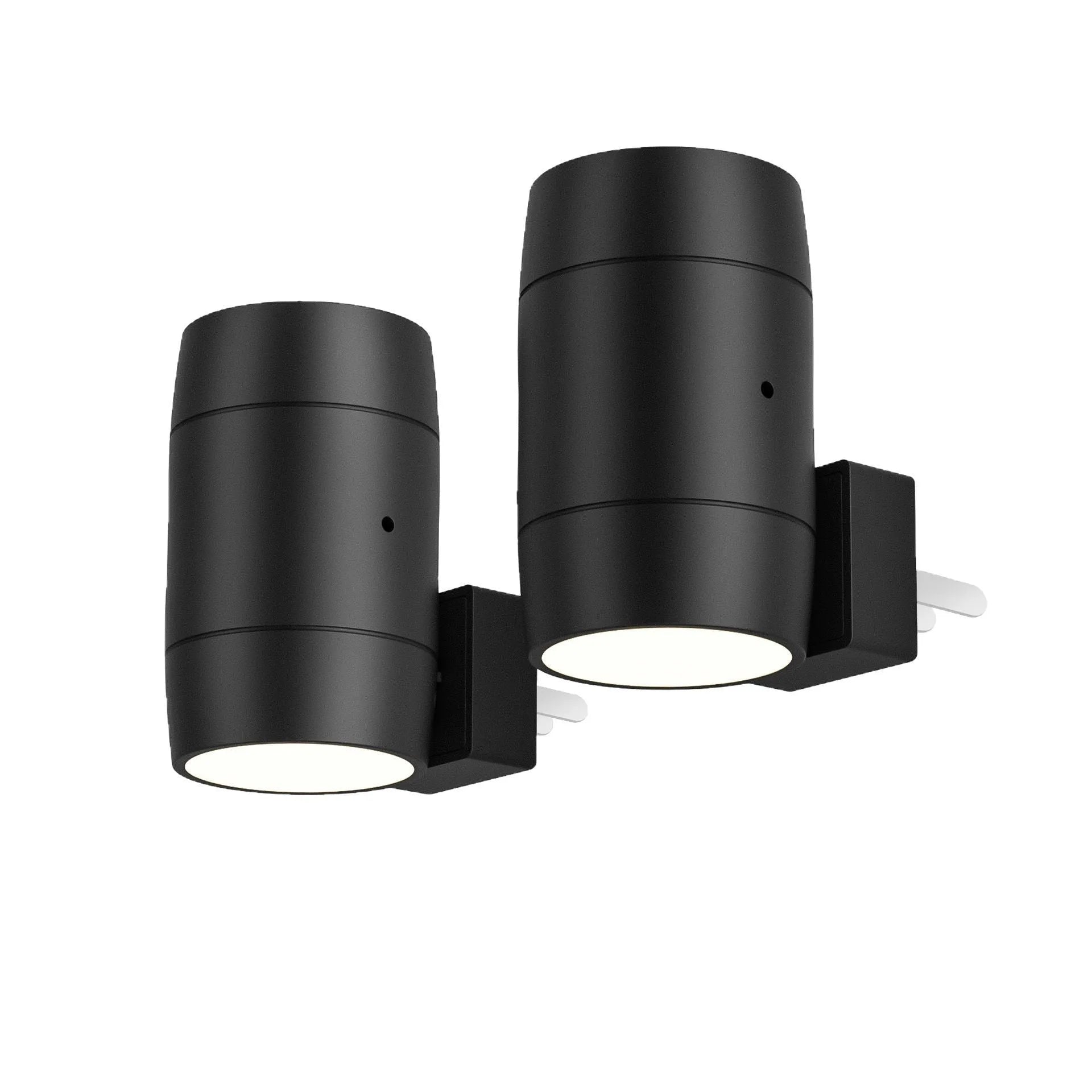 Small adjustable brightness night lamp with rotatable direct plug showing warm light illumination