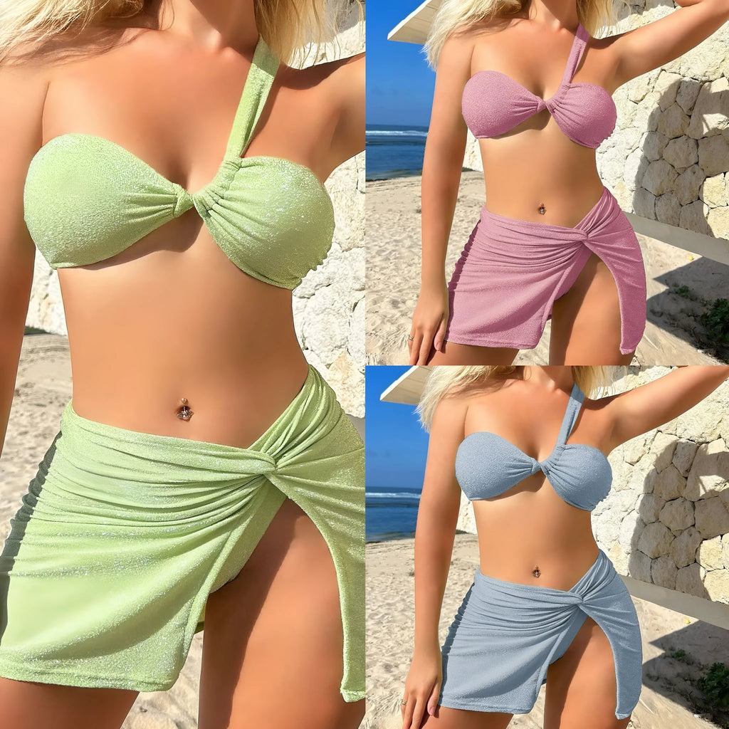 Women's one-shoulder tube top three-piece swimsuit set in glossy polyester, shown in light green.