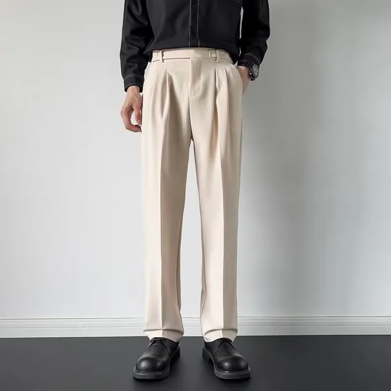 Men's straight-leg loose fit suit trousers in apricot colour on a hanger