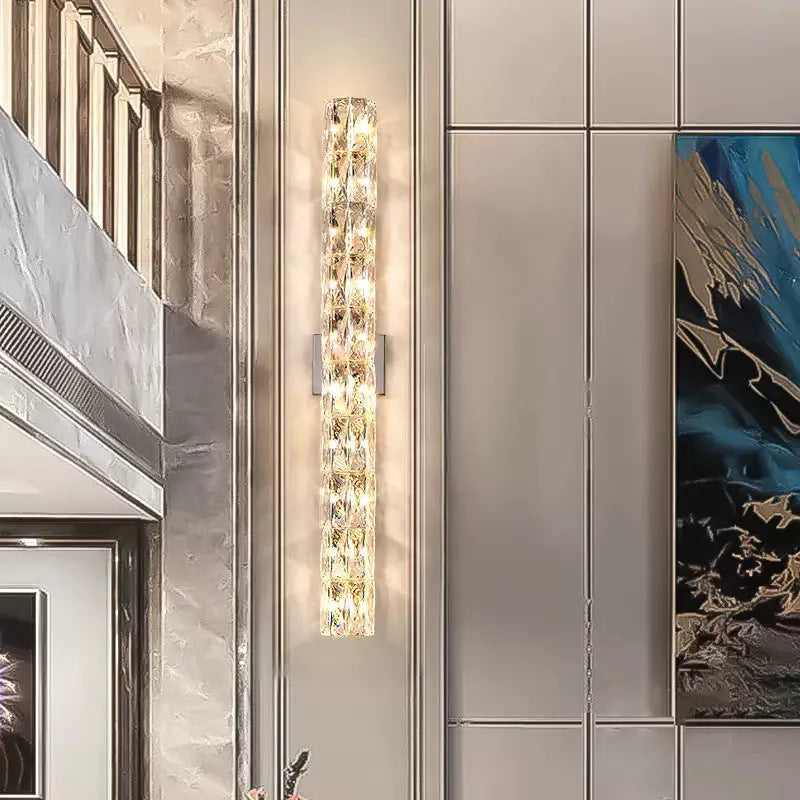 Crystal LED wall lamp with stainless steel frame in chrome finish showing tri-colour lighting
