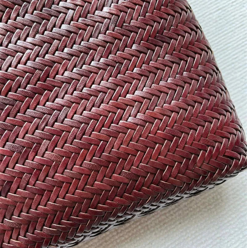 Brown woven leather tote bag with three-dimensional pocket and polyester lining