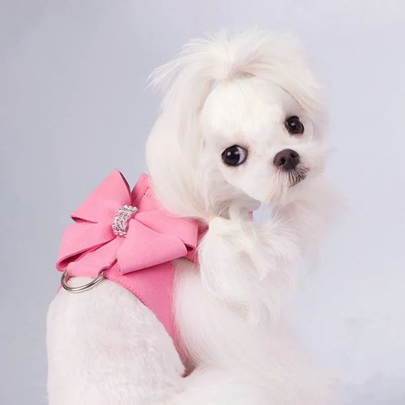 Adjustable puppy chest strap with bowknot design in microfiber material showing pink blue orange colour options