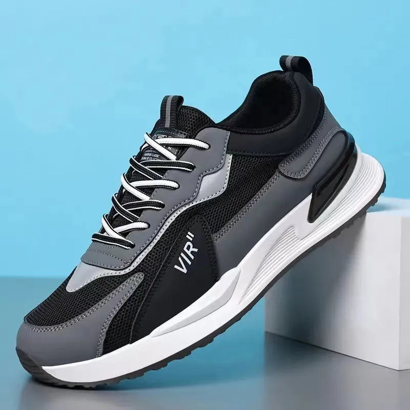 Men's low-top lace-up sneakers with colour block mesh upper and injection moulded sole.