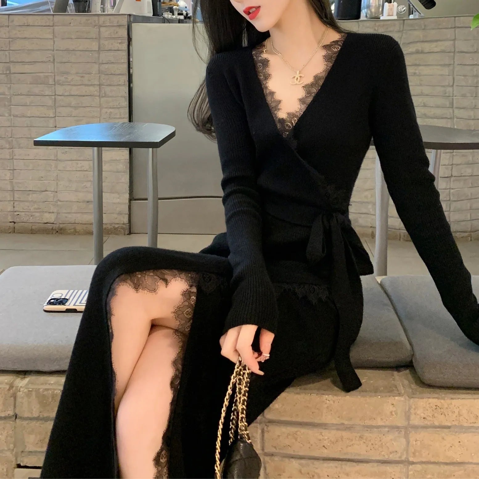 Women's solid black slim fit wool skirt with princess dress styling and free size fitting