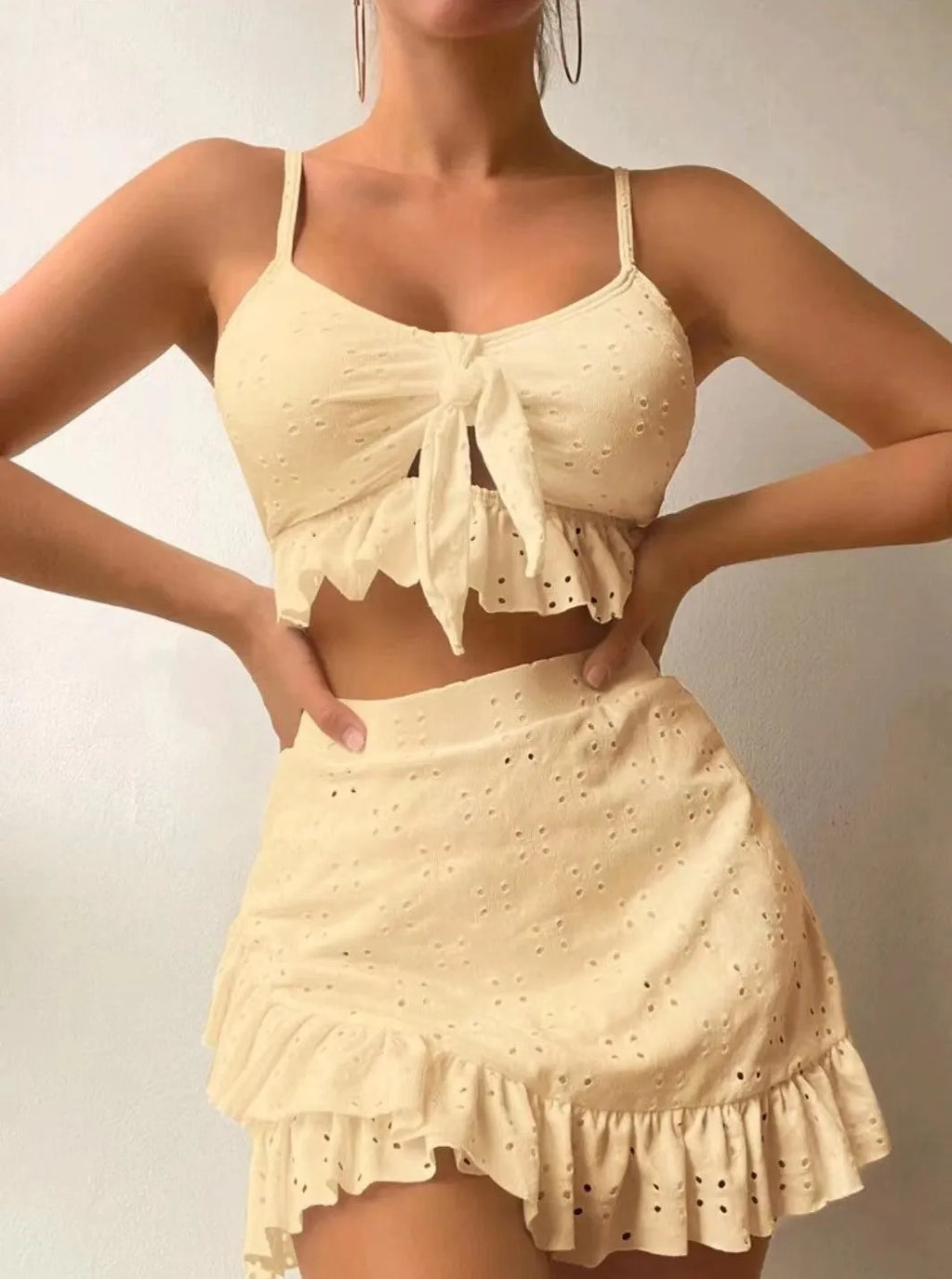 Women's three-piece bikini swimsuit with split hip skirt in multiple colour options