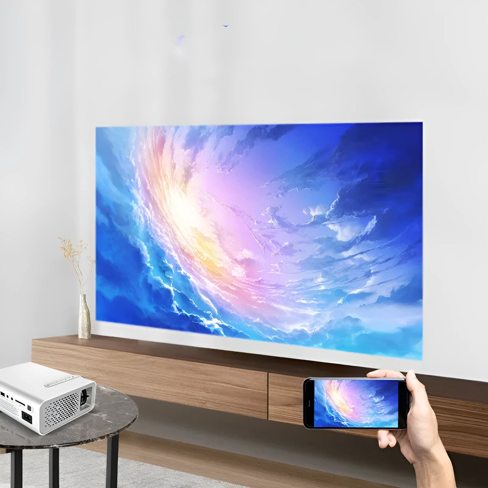 YG530 mini mobile phone projector in black or white showing wireless connection and large projection screen