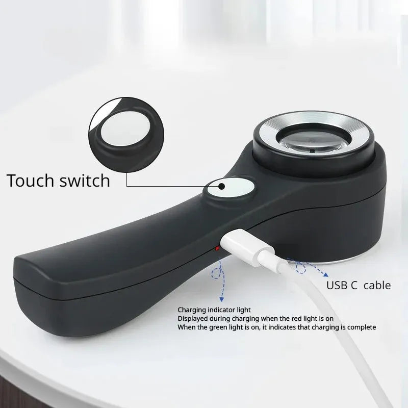 Black jewellery appraisal magnifying glass with LED lights and USB-C charging port