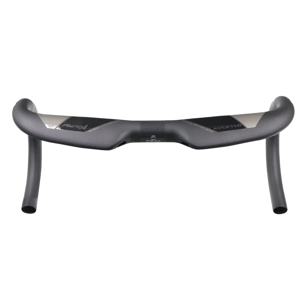Wei Bike matt carbon fibre bent road bicycle handlebar showing its curved shape.