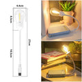 Folding USB rechargeable night light with warm white tungsten bulb, shown in open position.