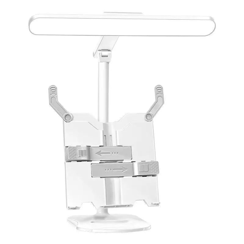 Adjustable desk lamp with integrated bookshelf showing three colour temperature settings and USB charging port
