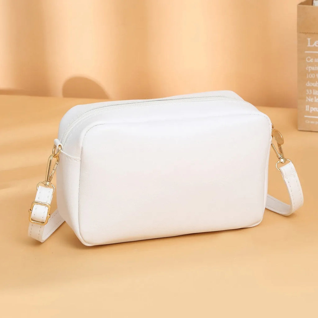 Women's solid colour PU shoulder bag with three-dimensional pocket in horizontal square shape