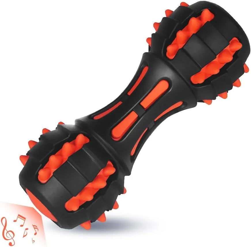 Red rubber dumbbell-shaped dog chew toy with textured surface for aggressive chewers
