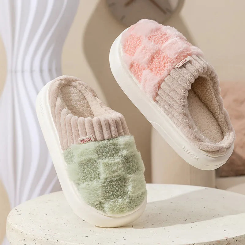 Women's plaid patterned plush slippers with coral velvet upper and non-slip PVC sole in coffee colour.