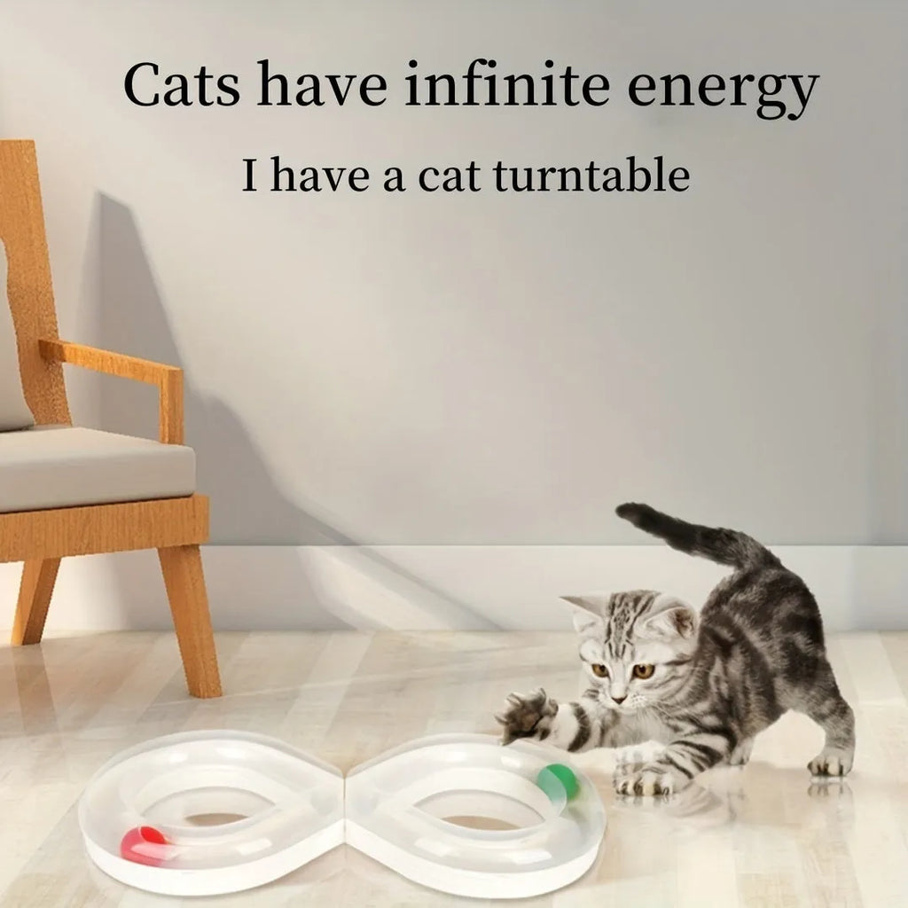 Blue and white cat turntable toy with rotating track ball and teasing stick for feline play