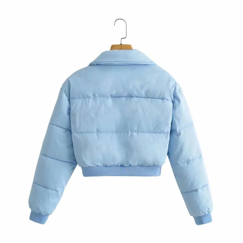 Women's loose blue polyester jacket with long sleeves and regular fit