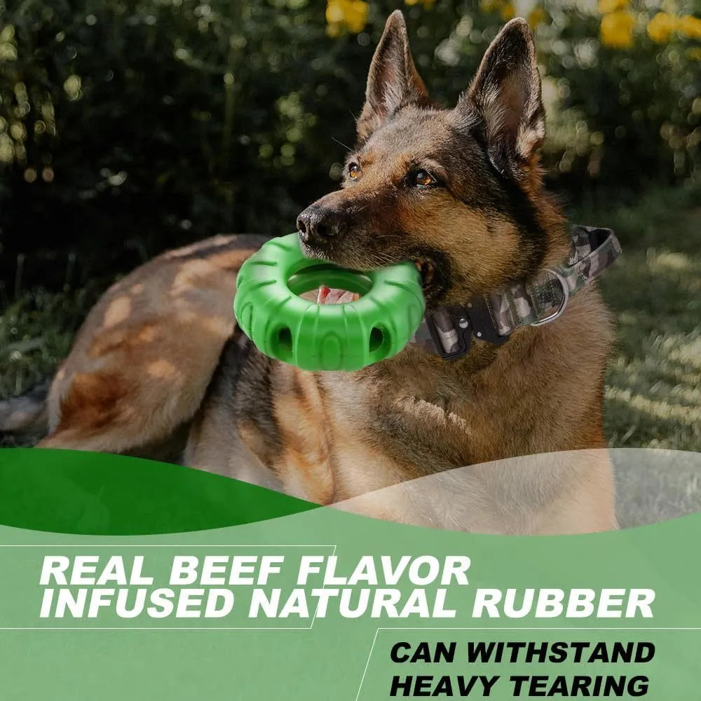 Blue beef-flavoured rubber tyre dog toy with oval holes for treat dispensing