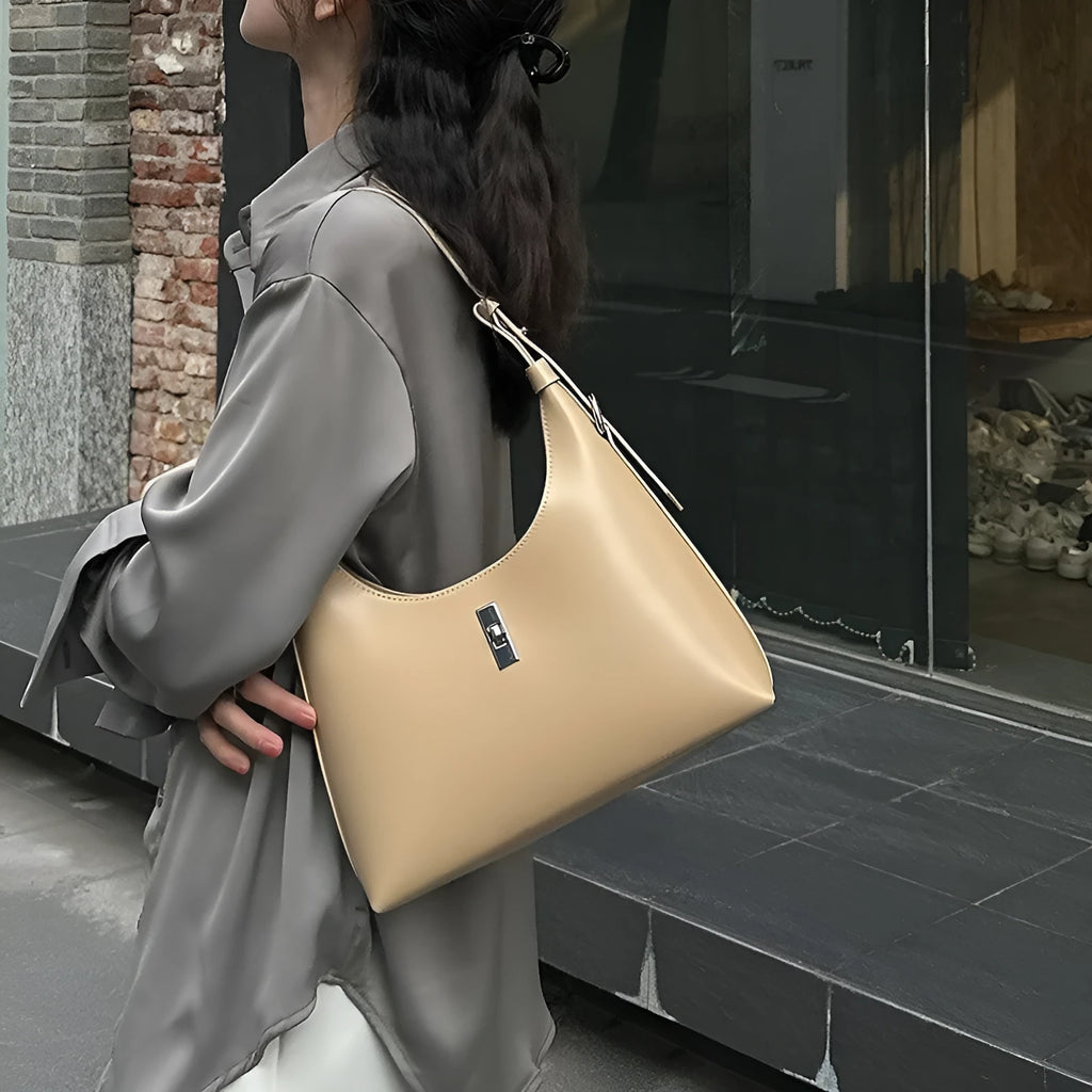 Genuine leather dumpling-shaped crossbody bag with organised compartments in six colour options
