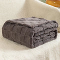 Geometric pattern polyester blanket in creamy white colour showing modern simple design