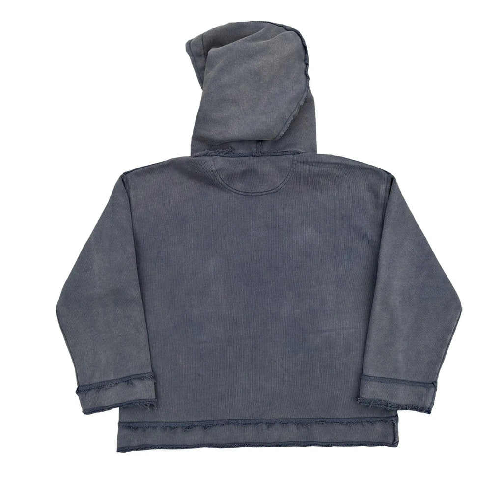 Dark blue hooded sweatshirt with a graphic design on the back, shown in a casual setting.