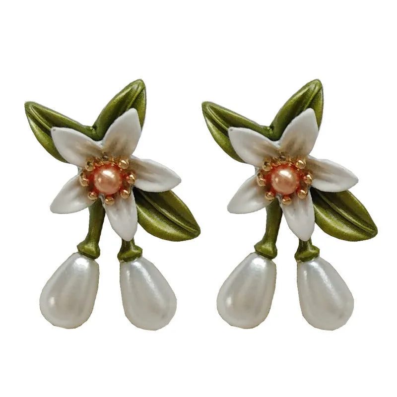 Alloy needle camellia flower earrings for women in sterling silver and coloured variations