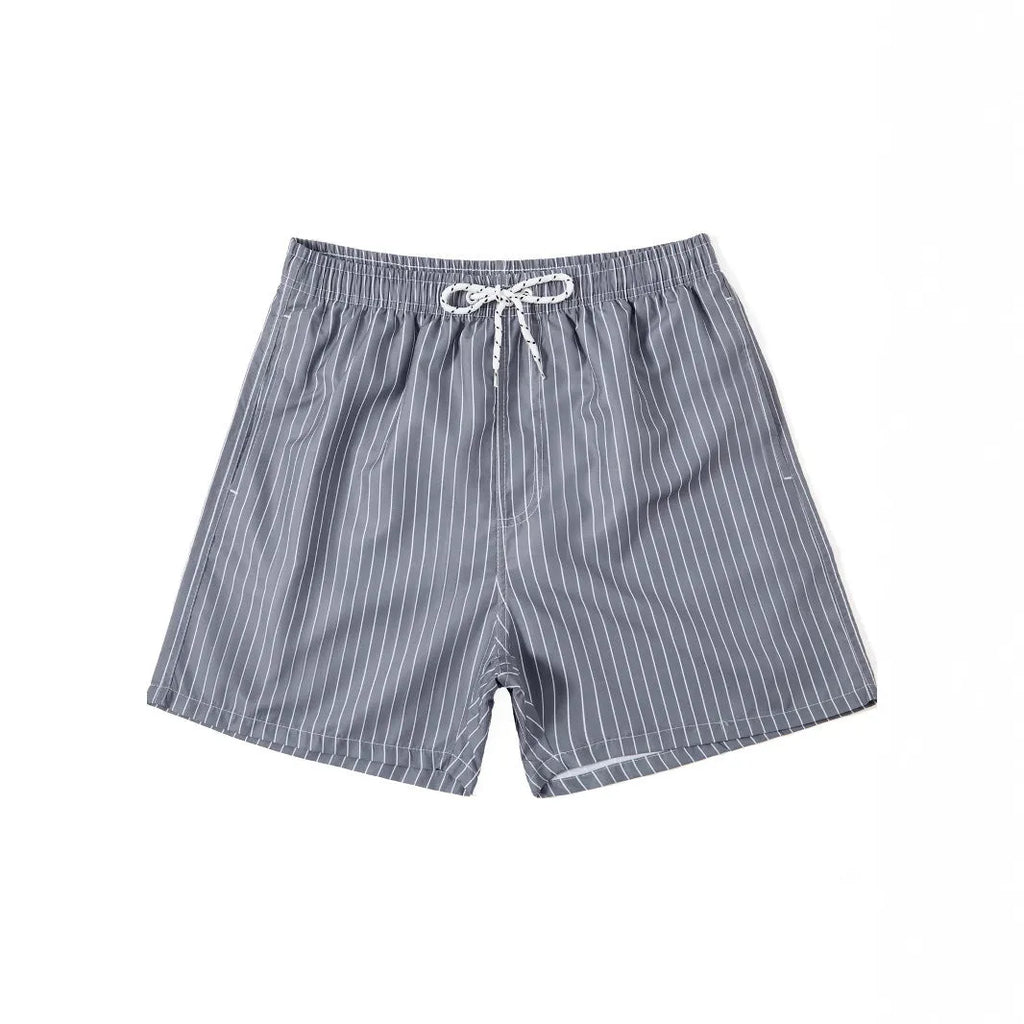 Men's striped beach shorts in navy blue, available in Asian sizes S to XXL with a straight-leg opening.