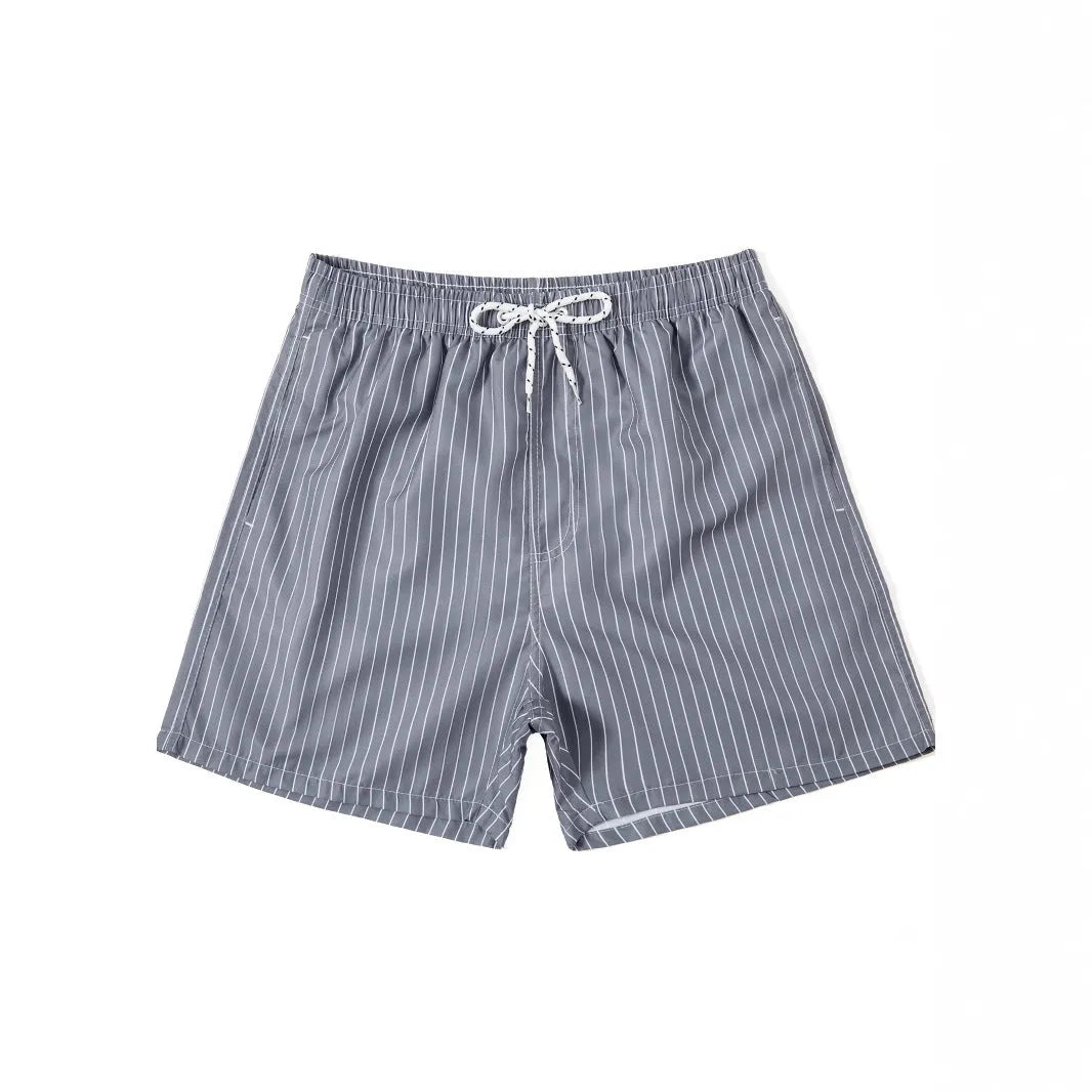 Men's striped beach shorts in navy blue, available in Asian sizes S to XXL with a straight-leg opening.