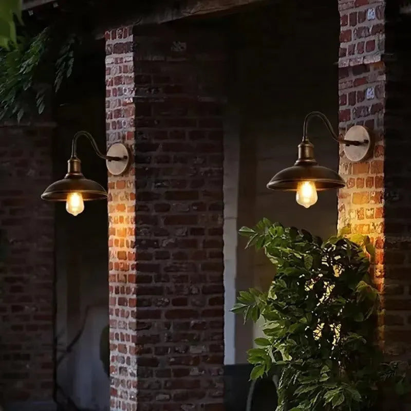 Villa courtyard wall lamp showing adjustable right or oblique angle design in copper or silver finish