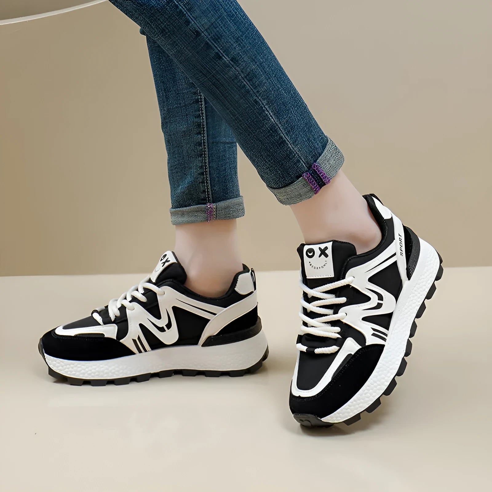 Women's black platform sports casual shoes with round toe and front lace-up closure on flat background
