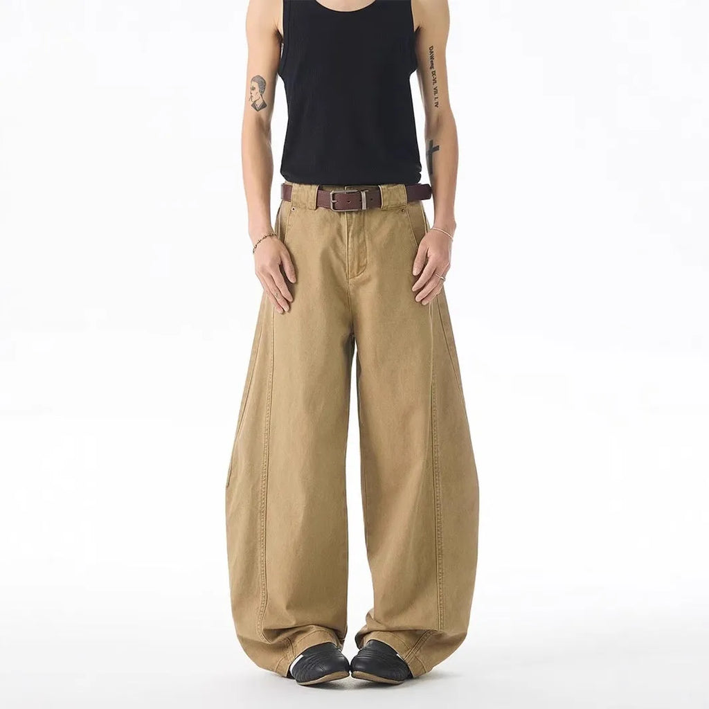 Brown men's loose fit jeans with straight leg design and button fly opening