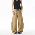 Brown men's loose fit jeans with straight leg design and button fly opening