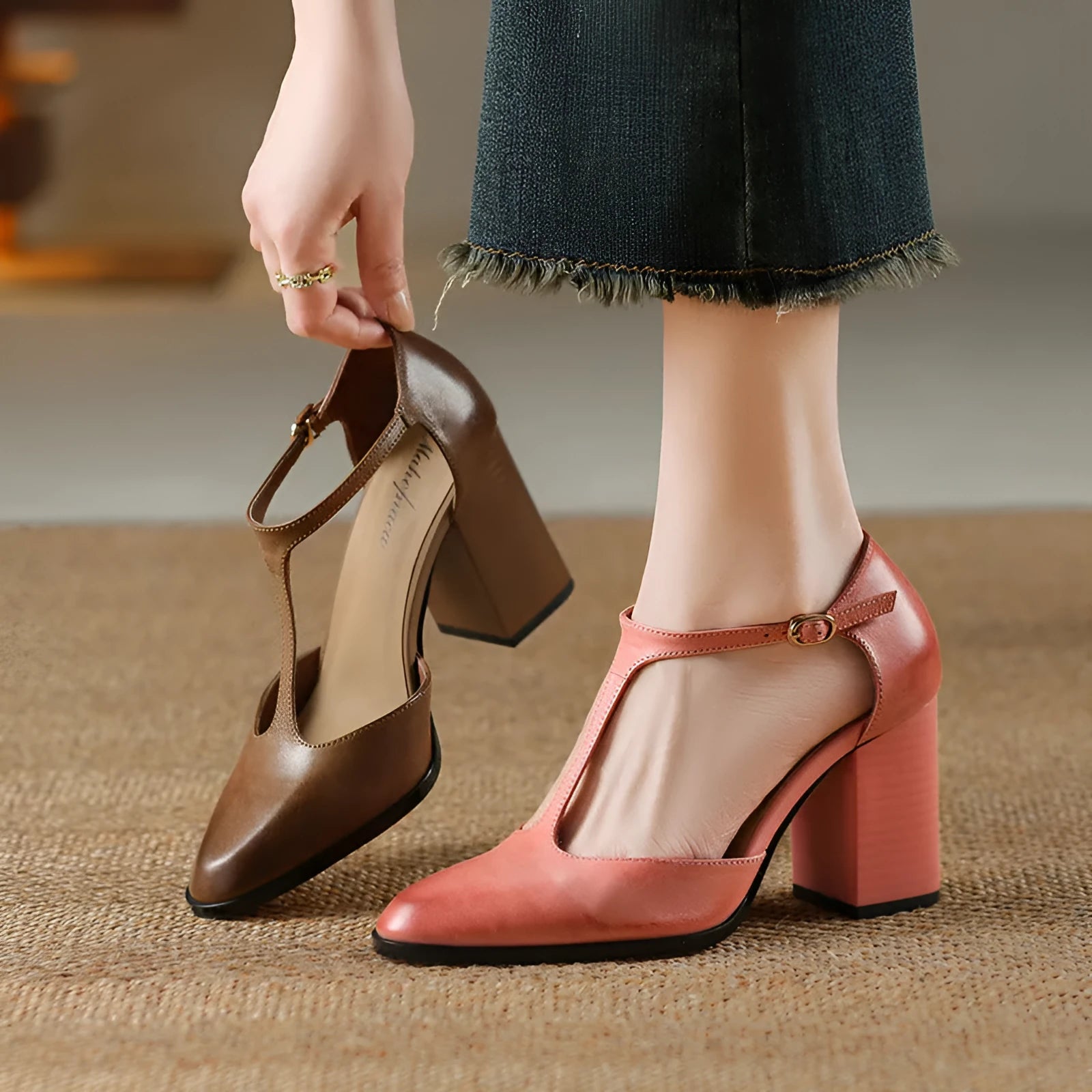 Women's dark brown retro pointed toe Mary Jane shoes with buckle and Baotou hollow design.