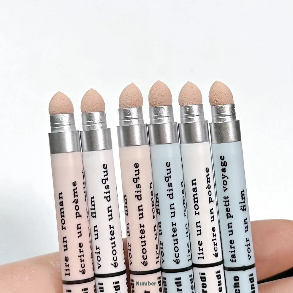 A Highlighting Brightening 2-in-1 Waterproof Eyeliner Pen showing its six colour options.