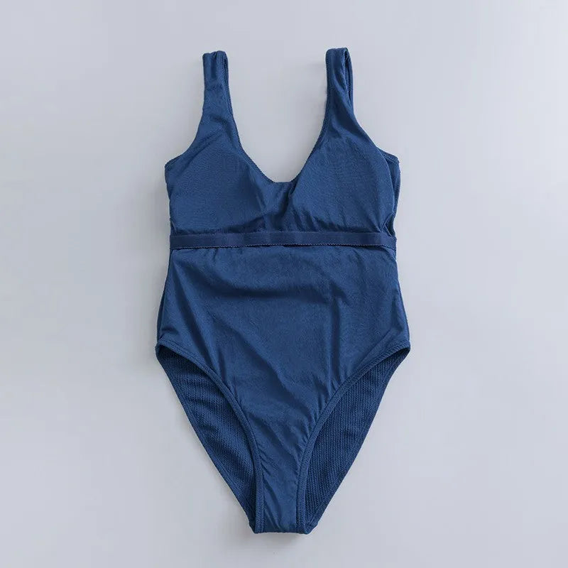 Navy blue women's slim fit one-piece swimsuit with triangle neckline and adjustable chest pads