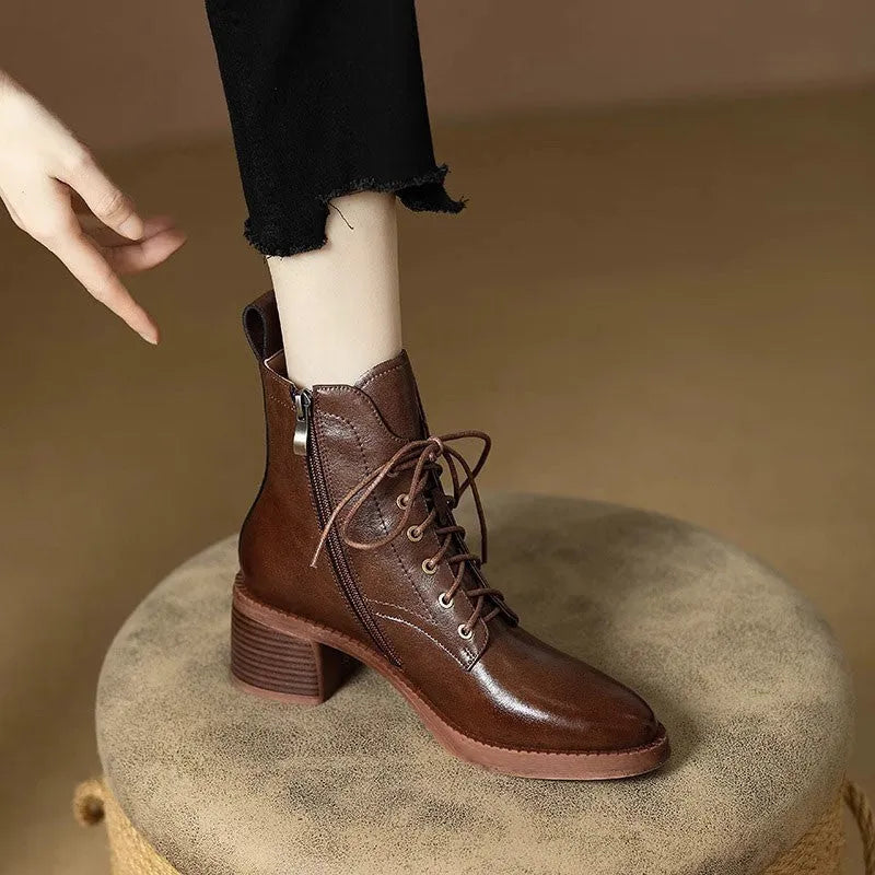 Women's black pointed toe ankle boots with 5.5cm heel and 13cm shaft height