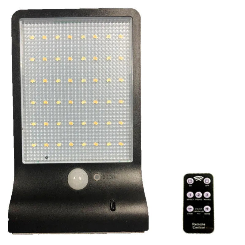 Black and white solar garden light with waterproof IP65 rating for outdoor courtyard and balcony use