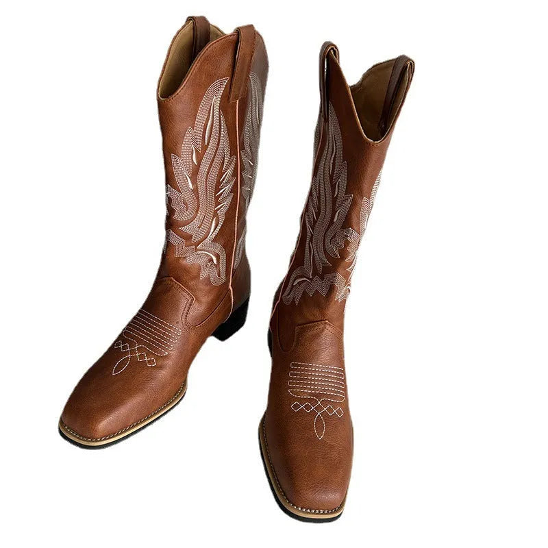 Brown women's mid-calf Martin boots with embroidered pattern and square low heel.