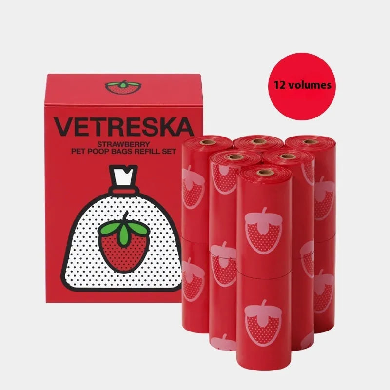 Dog poo bag dispenser capsule with strawberry pattern and roll of 15 biodegradable scented bags