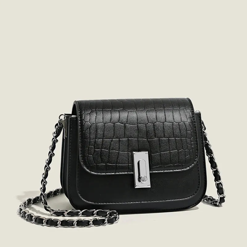 Women's black PU leather chain shoulder bag showing internal phone compartment and sewing thread detailing
