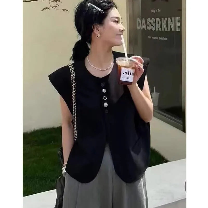 Women's loose fit polyester vest in milky white colour with front pocket