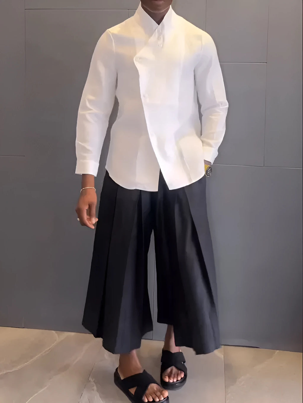 Women's white asymmetric hem shirt and black pleated trousers co-ord set in polyester