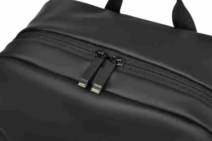 Waterproof PU leather backpack with sewing thread details in black, blue, and grey colour options