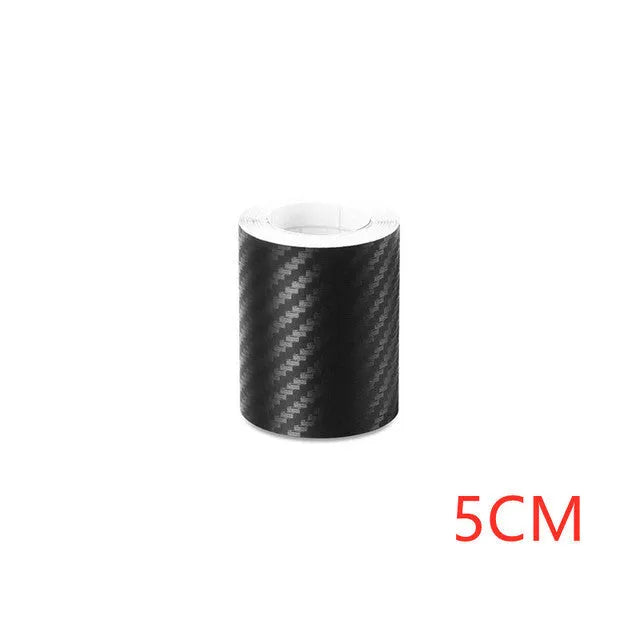 Matte black 3D carbon fibre roll for car door sill and bumper protection, showing texture and width options.