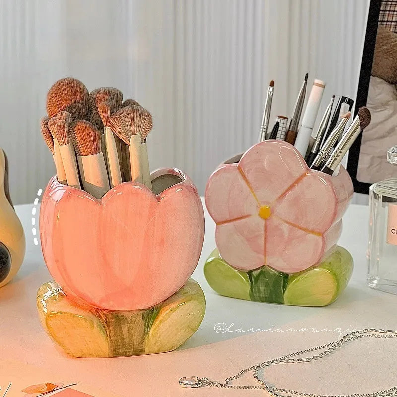 Ceramic flower pen holder storage box with floral design on desktop