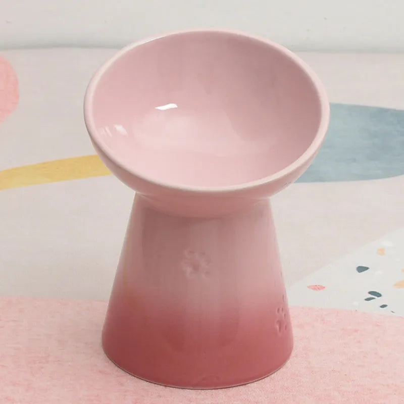 High-foot ceramic pet bowl with chin protector and anti-tumble base design