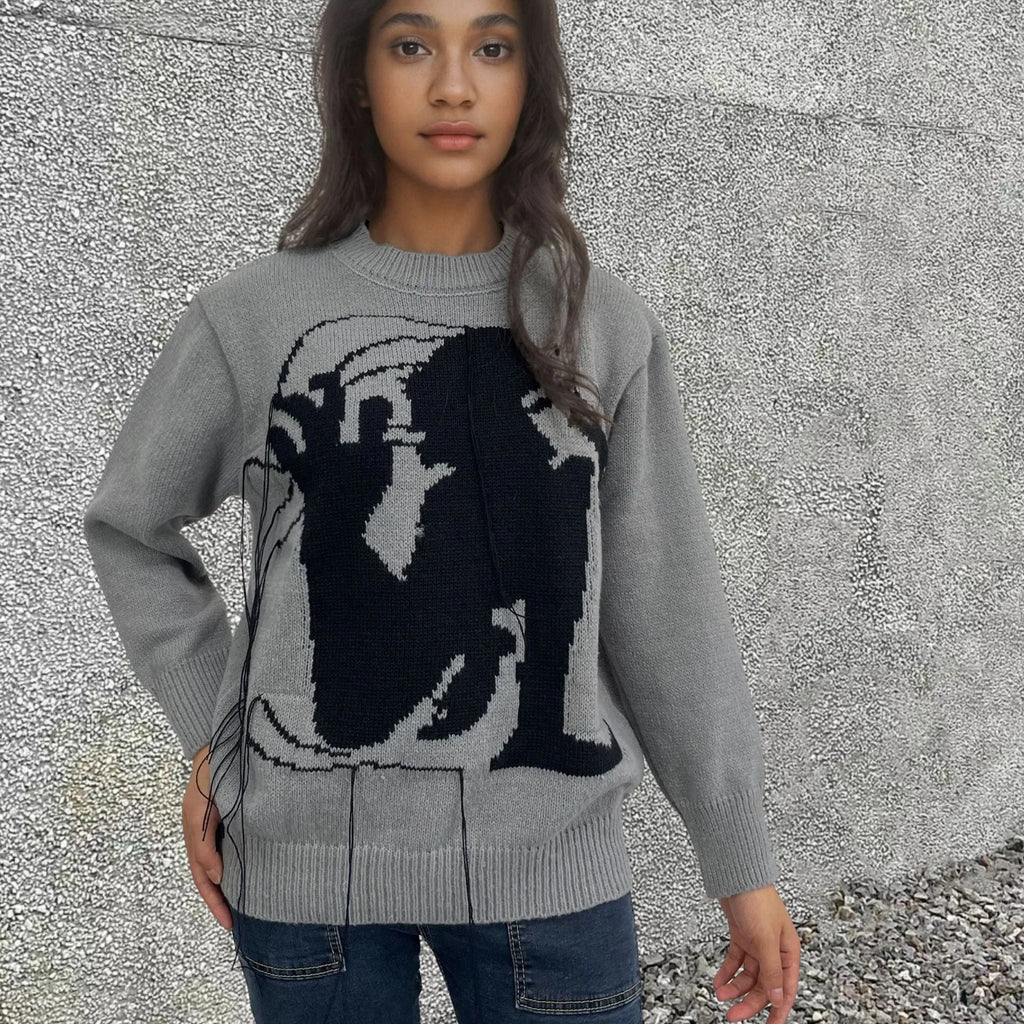 Grey women's alpaca wool sweater with abstract pattern and tassel design details