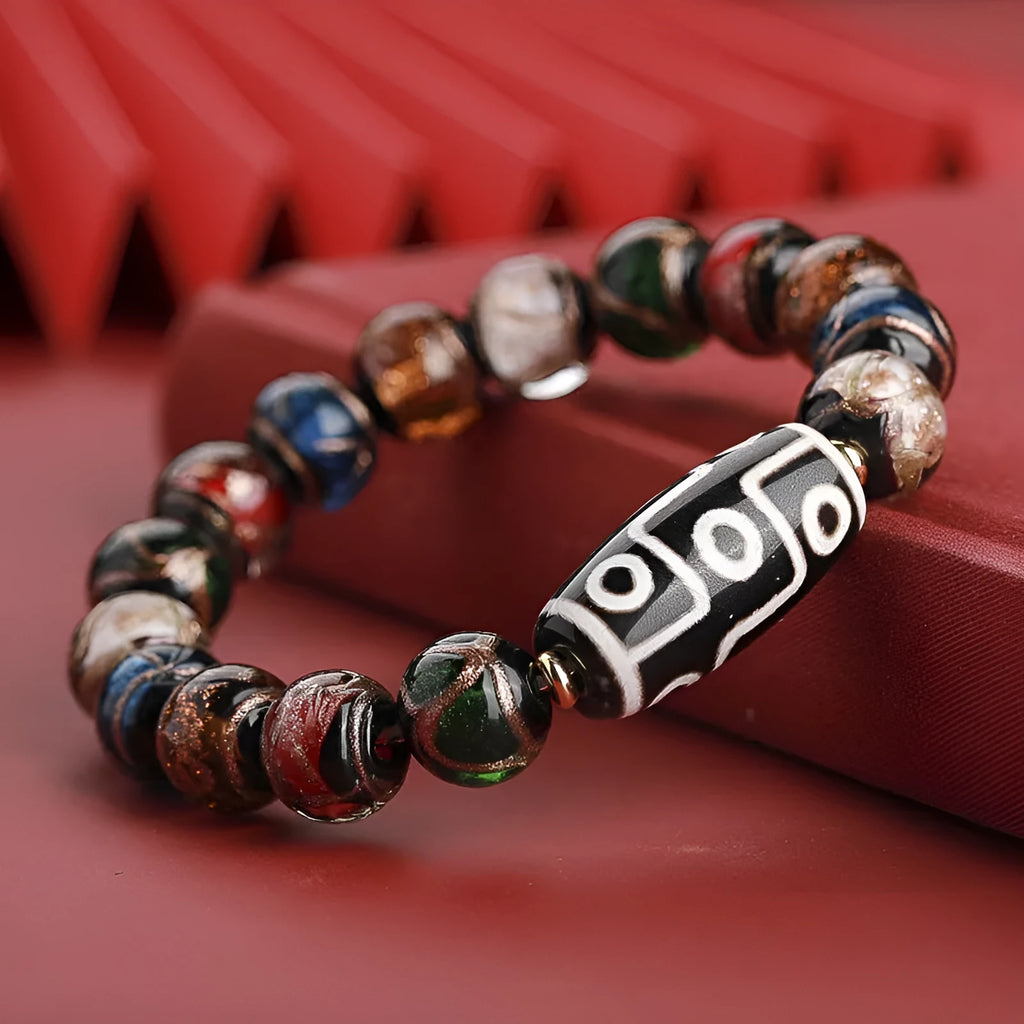Chinese style bracelet with colourful glaze beads and a central snake charm, showing 10mm bead size option.