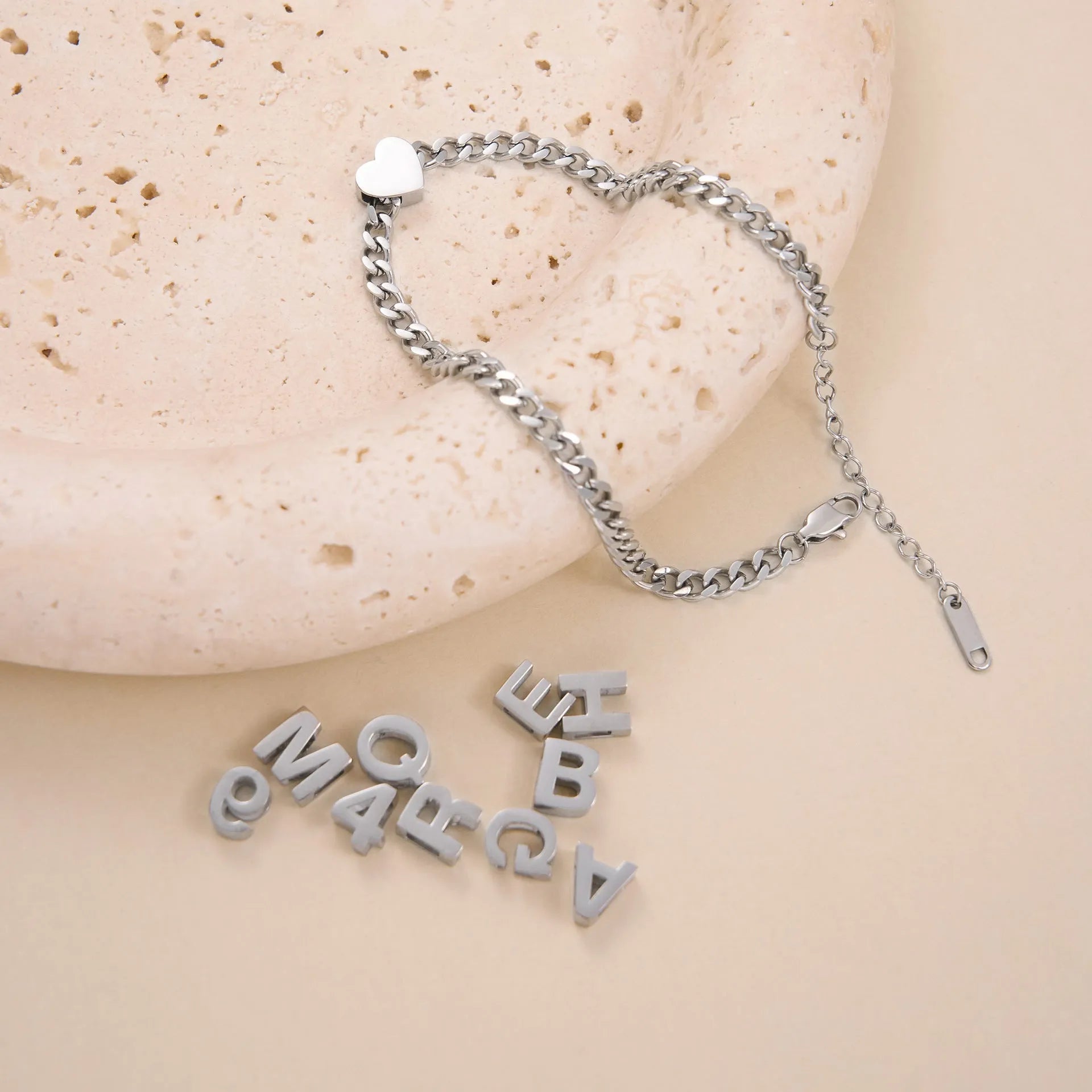 Titanium steel letter necklace with 40.5cm chain in gold electroplated finish showing number pendant