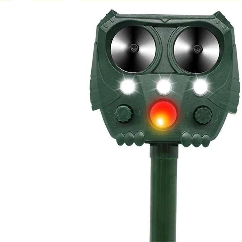 Green solar ultrasonic animal repeller unit with solar panel and LED lights
