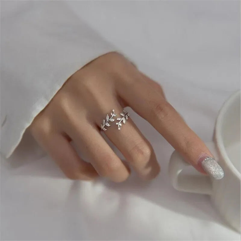 Copper branch ring with geometric leaf design in silver and gold electroplated colours