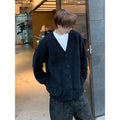 Men's V-neck cardigan sweater in army green colour showing loose fit and casual styling